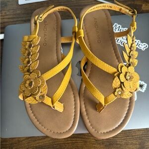 Women’s size 5.5 floral sandals. Mustard yellow